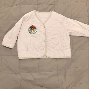 Quilted jacket with mushroom patch